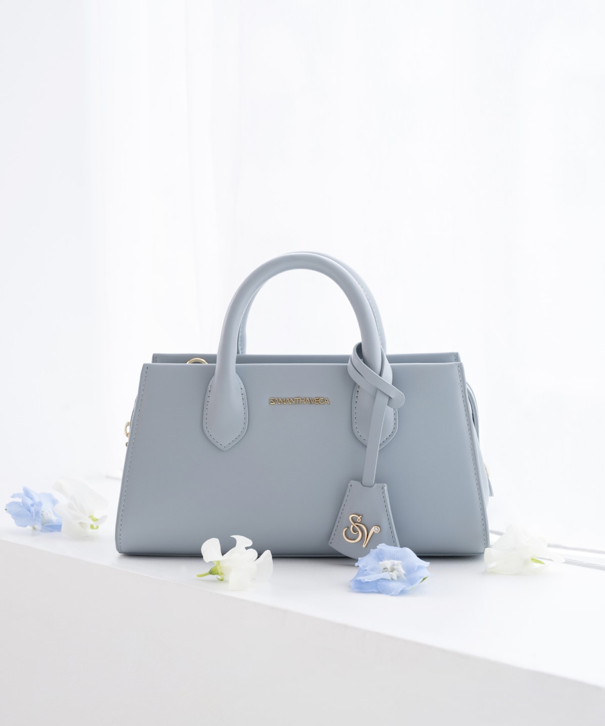 ロゴ金具ショルダーバッグ